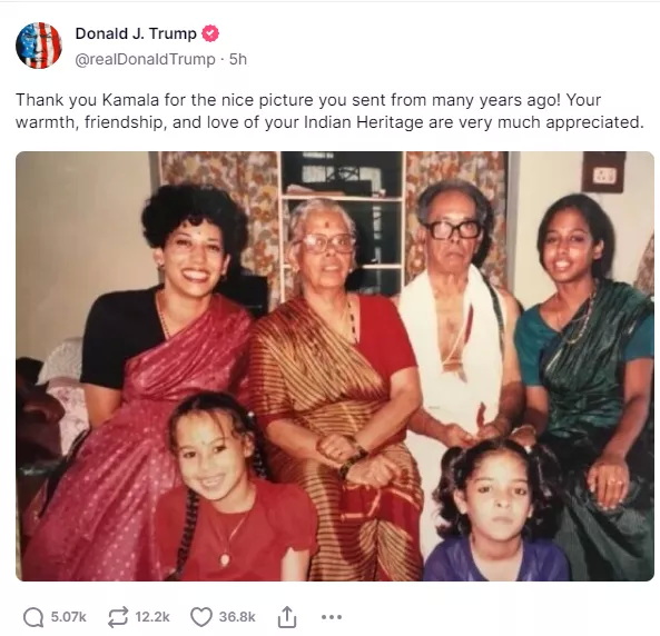 贺锦丽身着印度传统服饰与其印裔家庭成员的合影